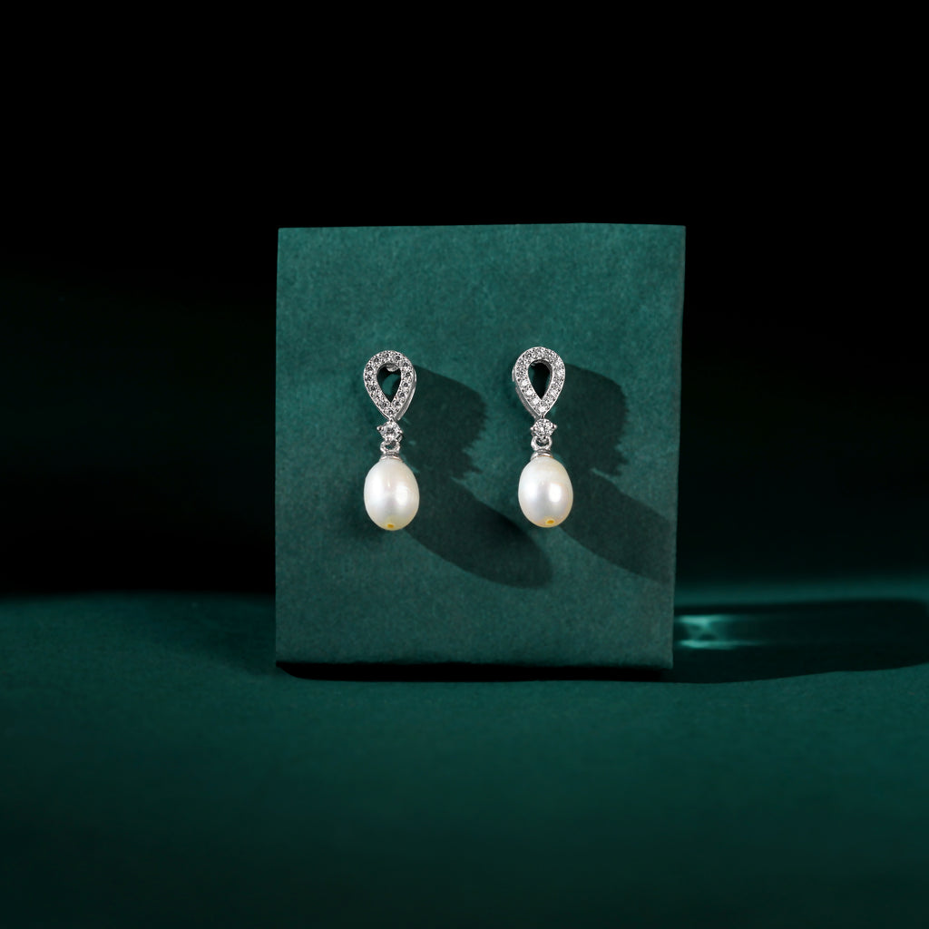 White Pearl Drop Earrings Adorned with Sparkling Stones