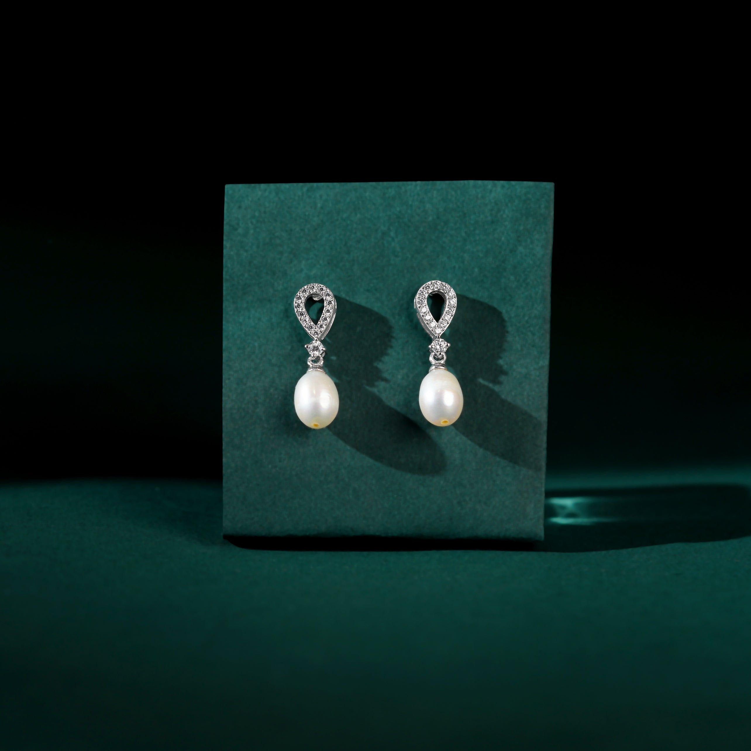 White Pearl Drop Earrings Adorned with Sparkling Stones